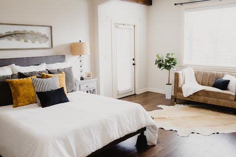 bedroom with stylish sofa