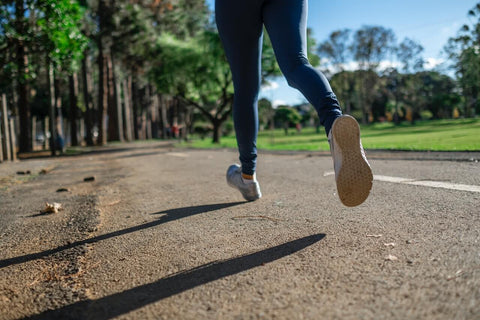 woman jogging close up in park