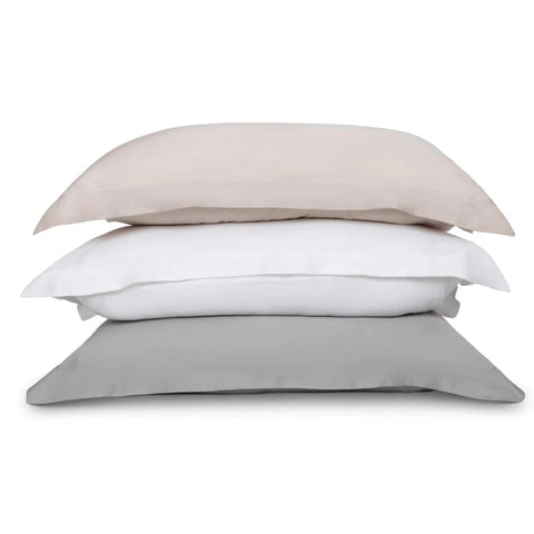 3 ethical bedding pillows stacked