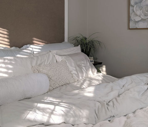 conventional silk sheets on bed